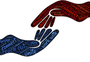 two hands reaching toward one another